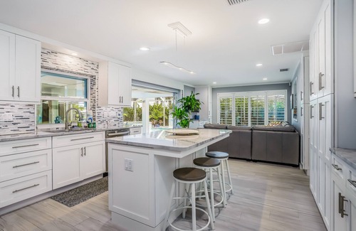 Yacht Club House | Waterfront escape in the heart of the action with pool, spa, grill, & WiFi