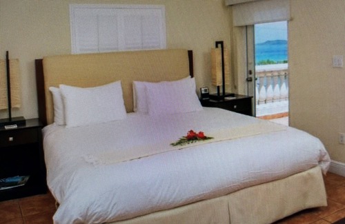 Estate Enighed Resort | WATERFRONT GRANDE BAY LUXURY RESORT
