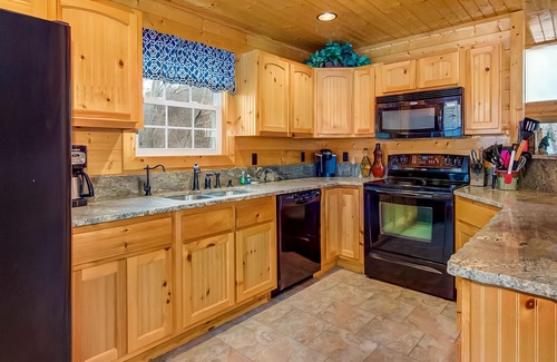 Maynardville House | Waterfront home with game room, theater, deck, dock & fireplace