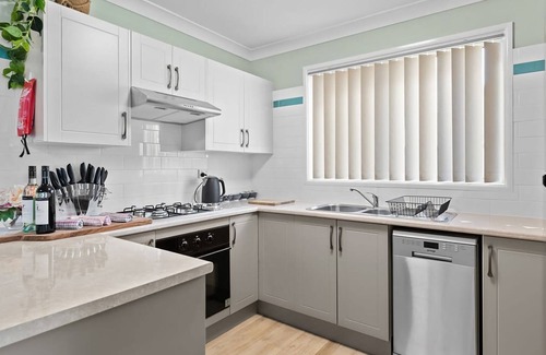 Chittaway Bay House | Waterfront Lakehouse Hot Tub Kayaks Paddle Board