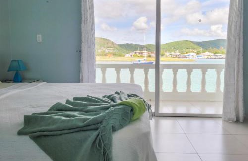 Jolly Harbour Apartment | Waterfront Luxury Retreat: 2-Bed Villa Sea Life