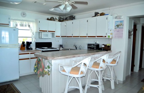 Rainbow Bay Villa | Waterfront. Private sea entry. Gazebo, Kayaks, Wifi. 300ft to Rainbow Beach