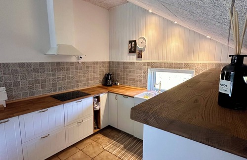 Skovmose Cottage | Welcome to your holiday retreat – relaxation and coziness await!