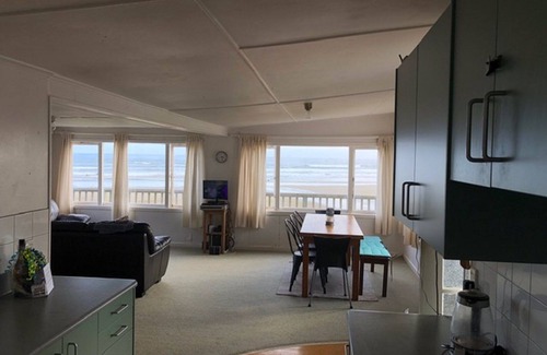 Glinks Gully House | West Coast Heaven. A rustic, cosy New Zealand bach.