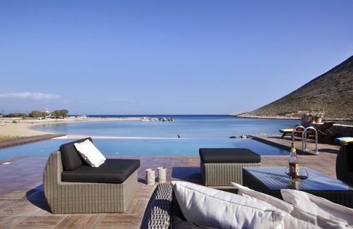 Stavros Villa | When the pool touches the sea.In front of the beach Antony Quinn danced syrtaki!