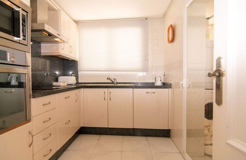 Nikki Beach Apartment | White Pearl Beach apartment with shared heated pool, BBQ