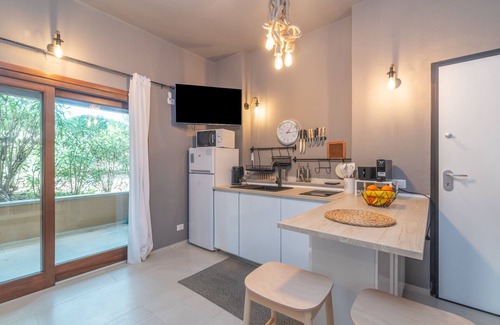 Portisco Apartment | White Sand House, Portisco, Italy