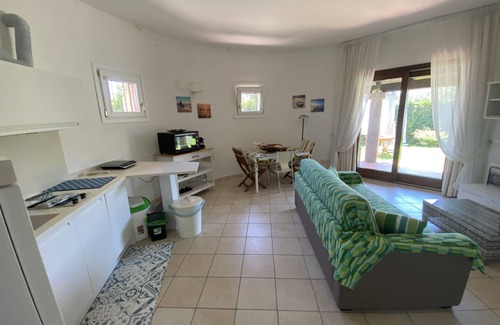 Porto San Paolo House | Wonderful head-end villa with large garden and solarium
