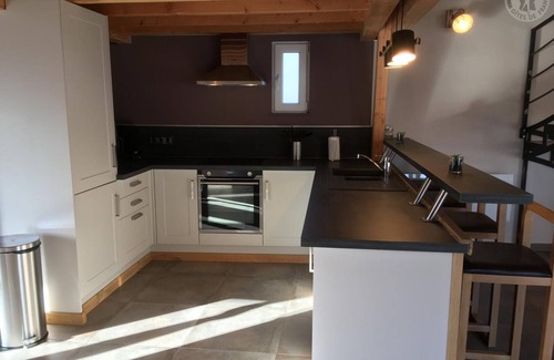 Hasnon Cottage | Wooden Chalet with Private Garden, Hot Tub, and Parking in Charming Village