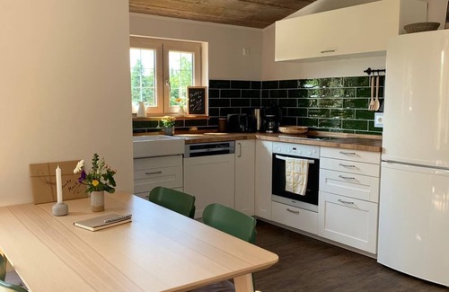 Am Dobrock House | Wooden house in the countryside with fireplace - Lytte Hytte | Holiday house Wingst