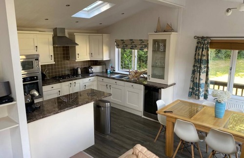 St Minver Cabin | Wooden Lodge in Tranquil Surroundings with Modern Amenities & outdoor Decking