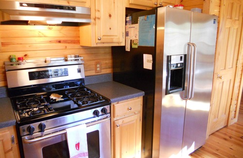 Leitchfield Cabin | Woodland secluded cabin on 7 acres, with private dock and kayaks