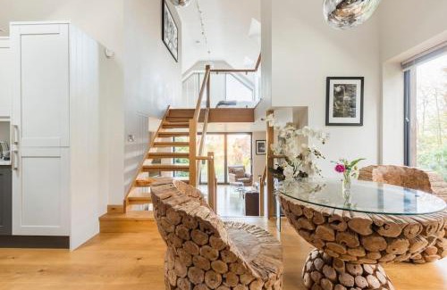 Cleeve House | Woodside Lodge, surrounded by woodland and beautiful gardens