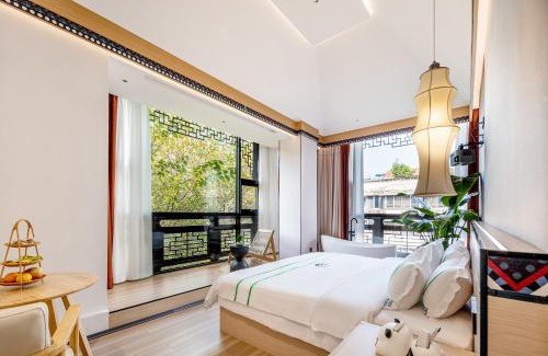 Chengdu City Centre Hotel | Xishu Garden Inn - Travel Agency service - Car Rent service - English Speaking