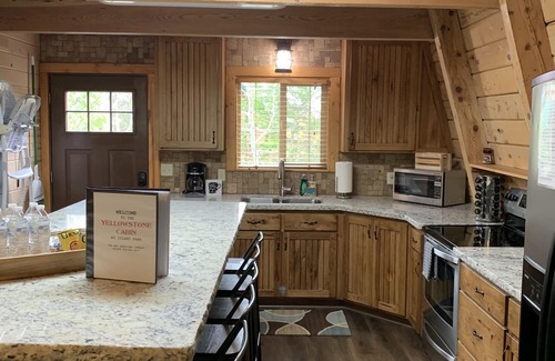 Island Park Cabin | YELLOWSTONE's PREMIER CABIN CLEAN& SPACIOUS KITCHEN with Fireplace, Dog Friendly