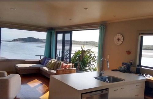Waitomo District House | You can't get closer to the water if you tried