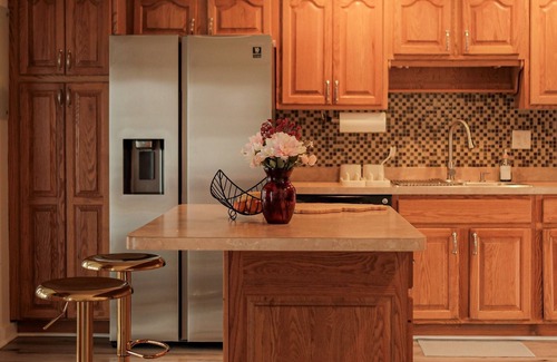 Streamwood House | Your Cozy Getaway with Sunroom & Gaming Room