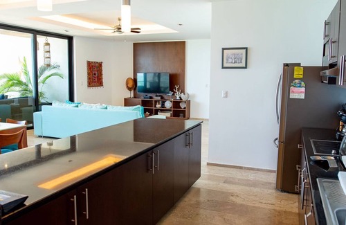 Chicxulub Puerto Apartment | Your home on the beach: beauty, comfort and tranquility!