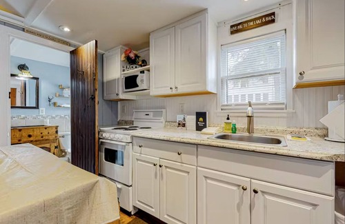 Winnisquam Cottage | Your Lakeside Getaway: Cozy Cottage, Dock, Endless Family Fun!
