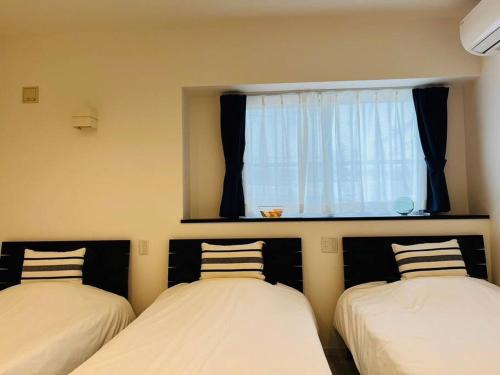 奥武島の浅築マンション 1フロア貸し切り BBQ可能 短い橋で島へアクセス テラスで海を楽しむ coco アイランド