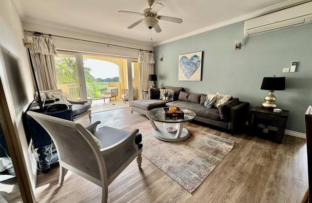 2/Bed Condo, w/AC, Pools, Rooftop patio, 5 Min to Beach, in a gated community.