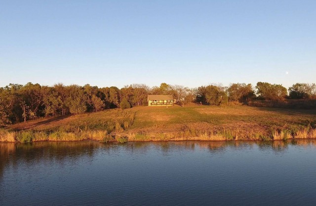 2-bedroom vacation home sitting on your own private lake for fishing/relaxing.