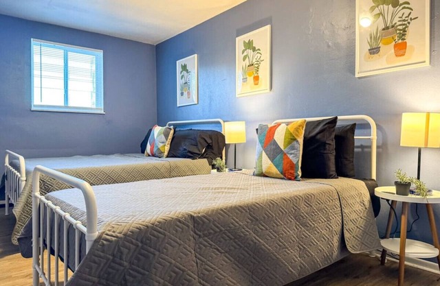 2 Full Apartments, 4 Bedrooms w/11 beds + Parking