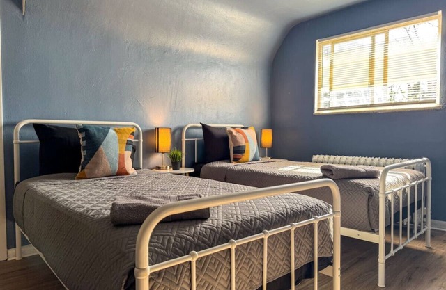 2 Full Apartments! 4 Bedrooms w/14 beds & Parking