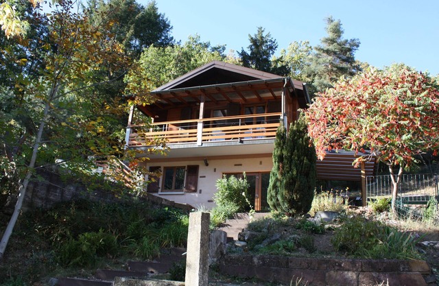 2-star chalet in a green setting with a view of the Romanesque Abbey