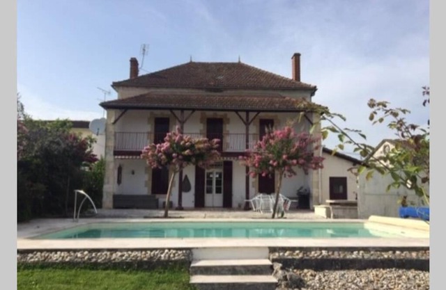 5-bedroom house with pool at edge of small village