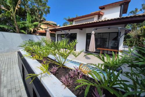 50m praia Cond pé na areia Alto padrao 4 suites Segur 24h Costa do sol Guaratuba Bertioga prox Riviera