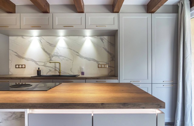 90 sqm apartment with floor-to-ceiling bay windows, a fully equipped kitchen