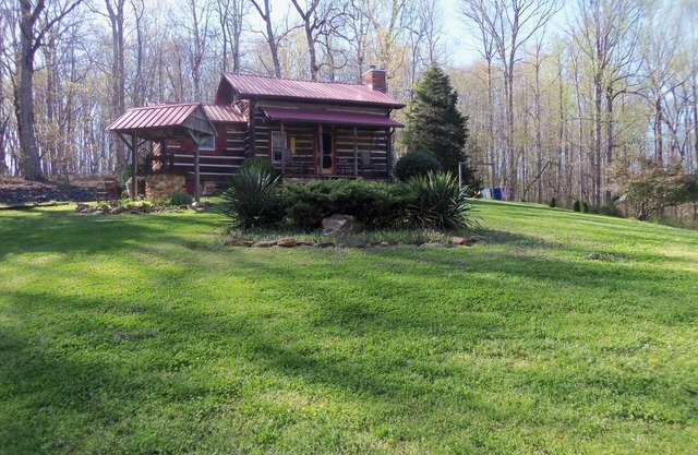 A authenic early American cabin located on a 85 acre farm in NC Foothills.