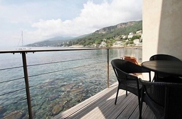 A balcony overlooking the sea