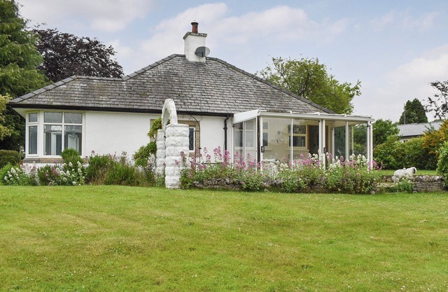 A charming and homely detached cottage all set out on one level.
