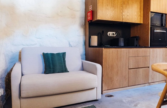 a cosy one-bedroom duplex accommodation unit