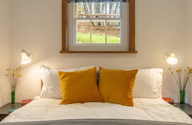 A light and airy property with a hammock and hot tub, situated on a working farm