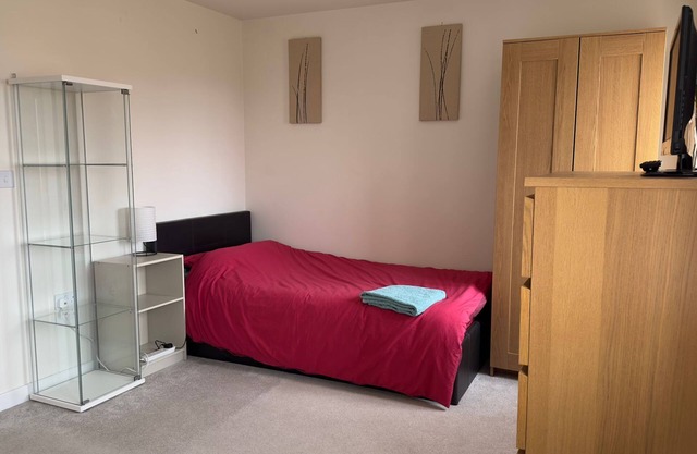 A light spacious room,with sofa and single bed. Private bathroom with shower.