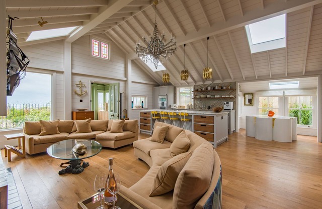 A luxurious waters-edge holiday home by the sea sleeping 11 right on the beach
