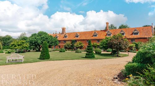 A Luxury Tudor Hall & Gardens Located on Breath-Taking Norfolk Estate