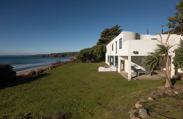 A sensational beach house just metres from Praa Sands Beach, with stunning sea views, large garden a