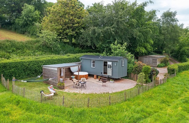 A shepherds hut that sleeps 2 guests in 1 bedroom