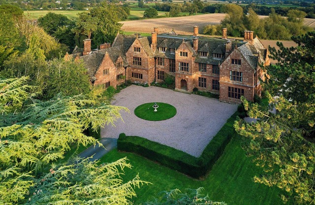 A simply stunning Edwardian red sandstone Arts and Crafts country house.