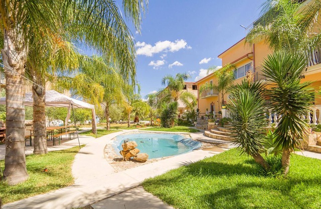 A spacious apartment with a bathing area in the garden awaits you.