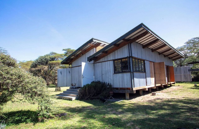 A unique, eco-friendly hideaway with walls that open to the savannah, allowing safari wildlife viewing from the comfort of the living room.
