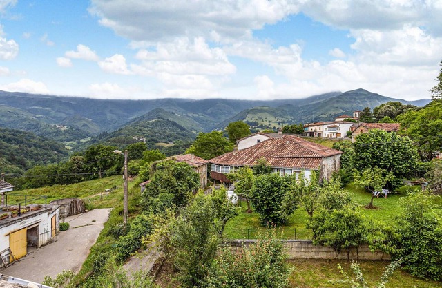 A vacation home in an idyllic area with a flowering garden.