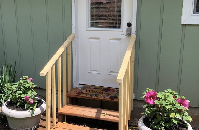 A waterfall, bountiful gardens and the sound of birds, fenced and pet friendly!