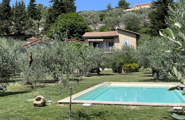 Adjoining apartment country house with superb views south.
