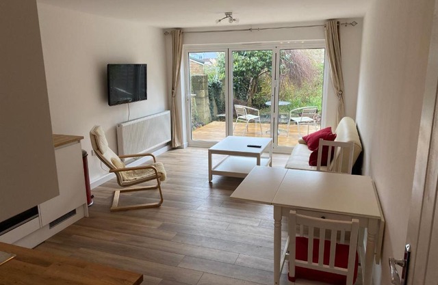 Adorable One-Bedroom Flat With Patio Garden.