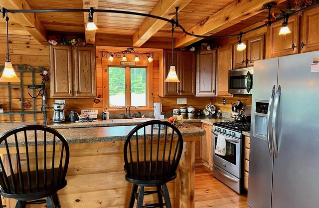 Adventure awaits at this log home with a spectacular view!